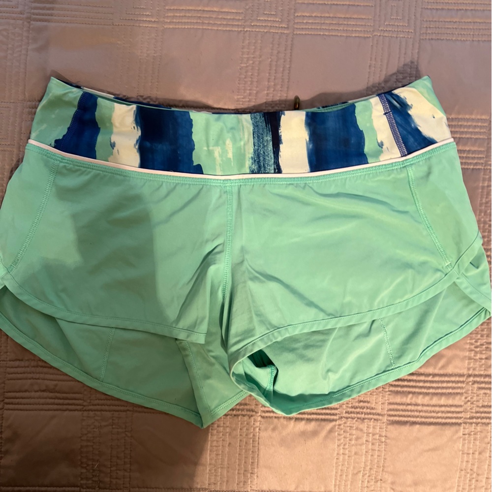 Lululemon shorts -green with blue/white/green waistband